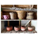Two shelves of flower pots, clay pots, sea shells