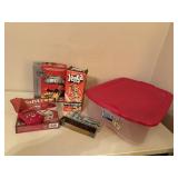 Storage tote of board games, Jenga, Yahtzee