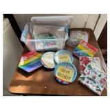 Tote of party paper supplies, plates, napkins,