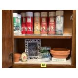 Floral spray paint, adhesives, hanger, clay pots