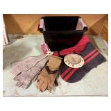 Tote of ski mittens, gloves, outdoor thermometer