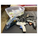 Tote of hot glue guns, stand, glue sticks