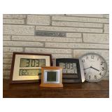 Atomic, battery operated wall clocks (4)