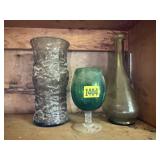 Green glassware, vase, bottle, stemware