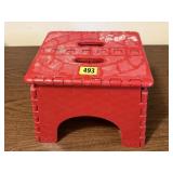 Red folding step stool