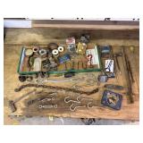 Wire, hand tools, hitch pins, hooks, tire gauge