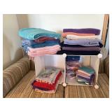 Organizer bins of bath towels