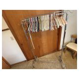 Portable clothing rack, clothes hangers included