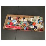 Box of thread spools