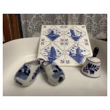 Dutch delft trivet, bell, wooden shoes