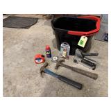 Bucket, hand tools, hammers, tape measure, stapler