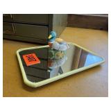 Hand mirror, duck figurine