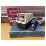 Webster Dictionaries, electric pencil sharpener,