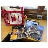 Crate of wildlife magazines, wood carving