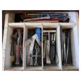 Contents of tool drawer, saw blades, punches