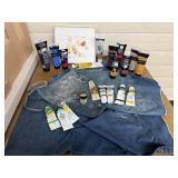 Art supplies, apron, paints