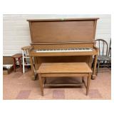Piano, bench included