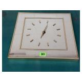 Mirrored battery operated wall clock