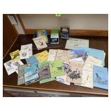 Wire paper basket, nature literature, guide books