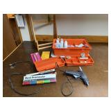 Tupperware container, art supplies, paints