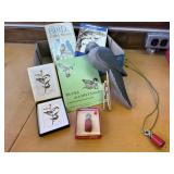 Bird guide books, bird calls, book labels, decoy