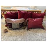 Wine colored throw pillows (5)