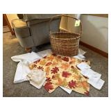 Wicker basket, table linens, cloth napkins, fall