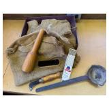 Box of primitives, burlap, cast iron scoop,