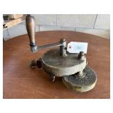 Hand crank bench grinder