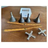 Metal funnels, folding tape measure, faucet knobs