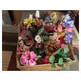 Box of silk, artificial flowers, greenery