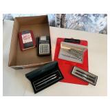Pen sets, calculator, password book