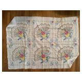 Embroidered quilt top