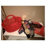 Basket of fashion scarves, belts