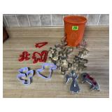 Tupperware canister, cookie cutters