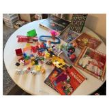 Assorted toys, comic books, puzzles, games,