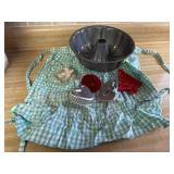 Vintage apron, cookie cutters, bundt cake pan