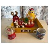 M & M candy dispenser, snow globe, mug, plush toys