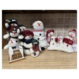 Animated, plush snowmen decorations