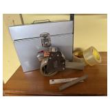 Metal file box, packing tape, tape roller