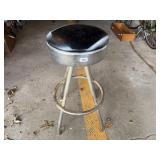 Round padded chrome stool