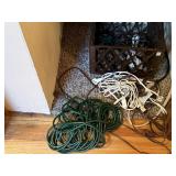 Plastic crate of power cords, surge protectors