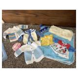 Mixed lot of doll, knitted baby clothes