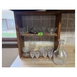 Primitive wood shelf, glassware, carafe, shot