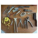 Hand tools, tape measure, pliers, clamps, vise