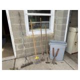Trash bin, garden tools, hoes, hedge trimmer