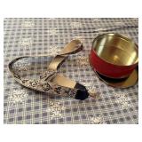 Tin, camera strap