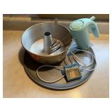 Pizza pan, bundt pan, hand mixer, candles