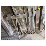 Schythe, axe, post hole diggers, hand saw
