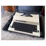 The Communicator portable electric typewriter,